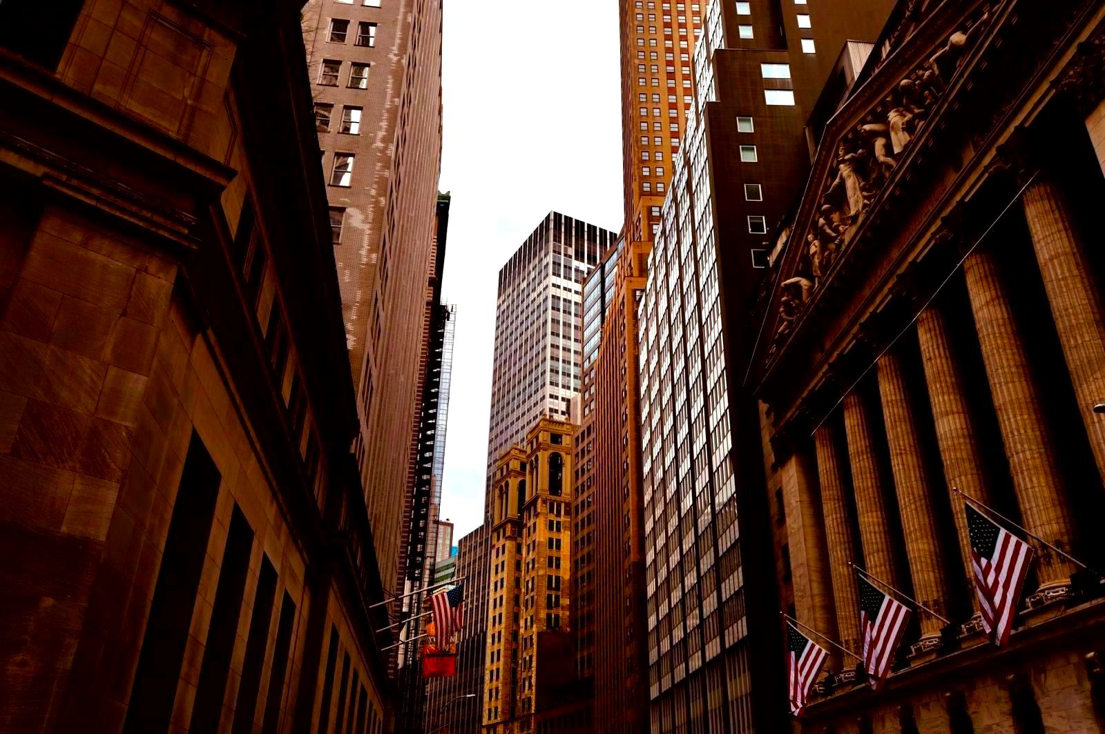 Iconic Wall Street skyline and financial district buildings New York City