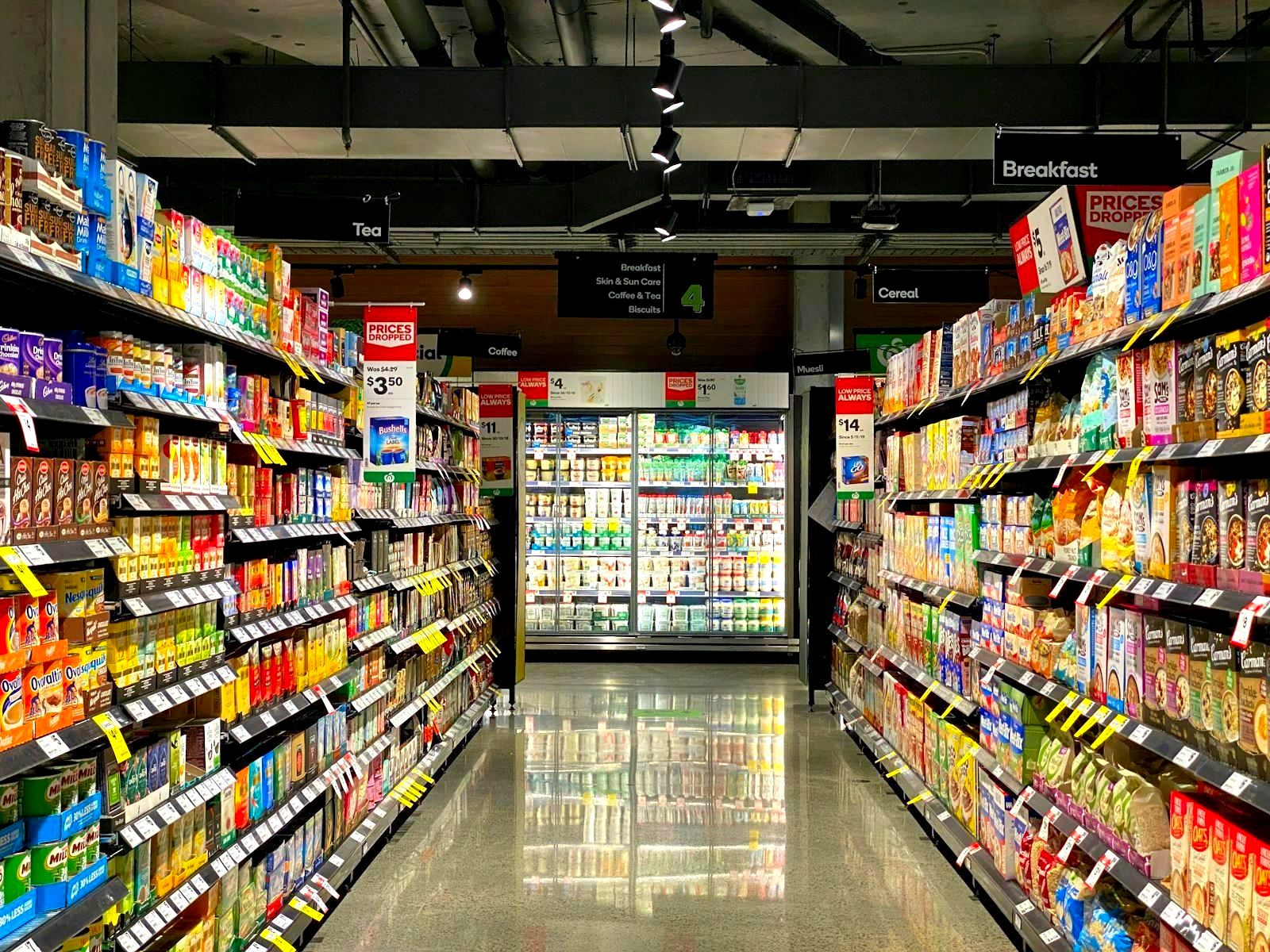 Shelves of consumer products in a retail store aisle