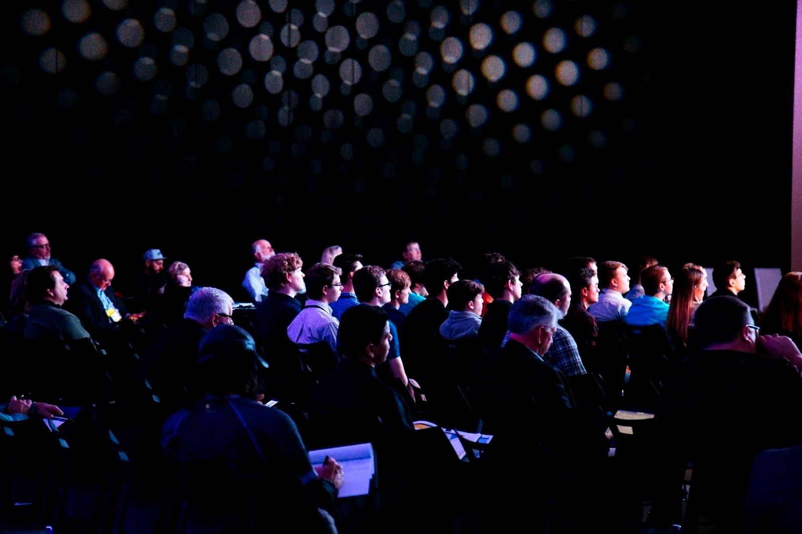 Corporate executives gathered at an international conference discussing climate and sustainability policy