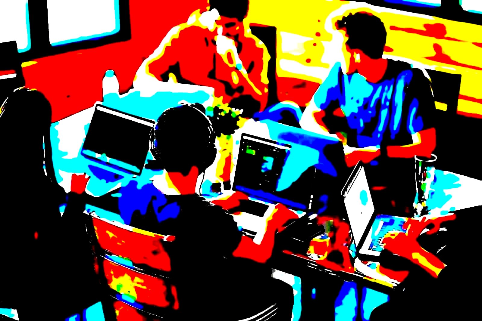 Mixed-demographic team collaborating at a conference table