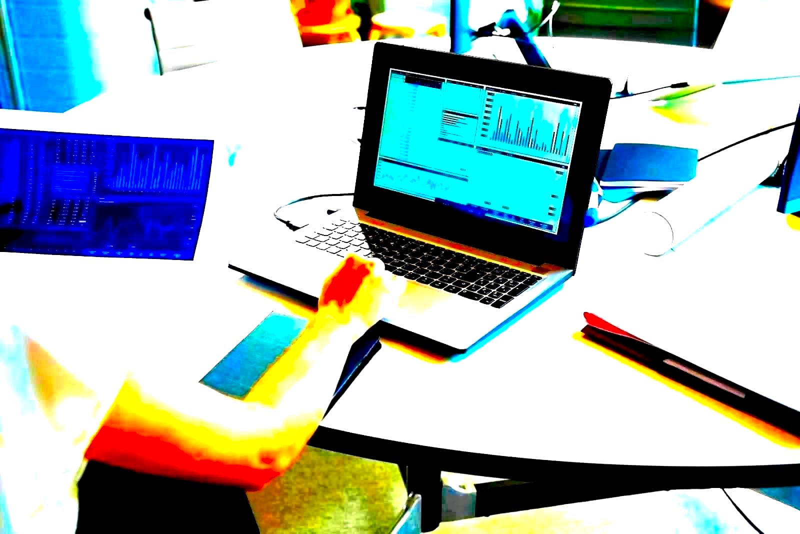 Data analysis charts and graphs on a computer screen
