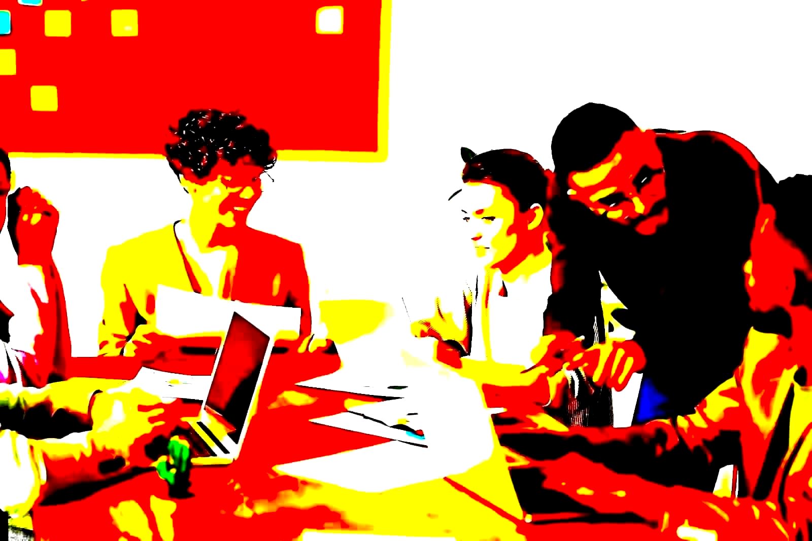 Corporate boardroom with executives reviewing reports